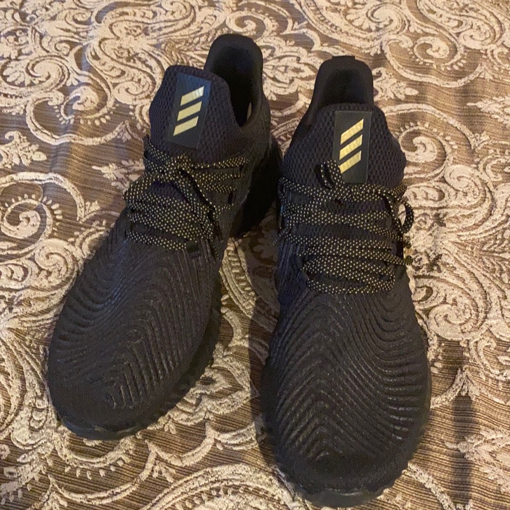 Adidas tennis shoes.